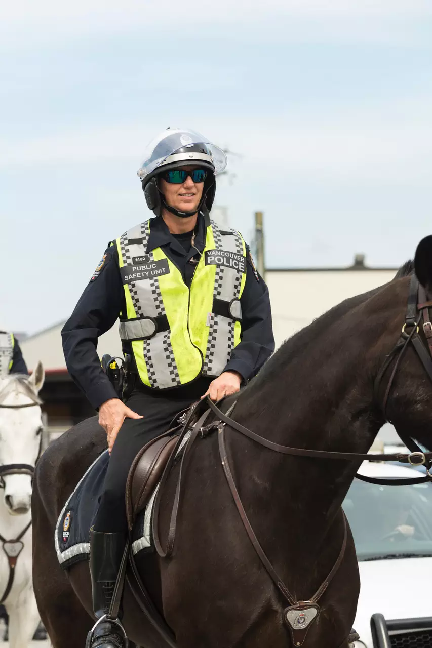 Darcy Henkel as a Vancouver Police mounted officer