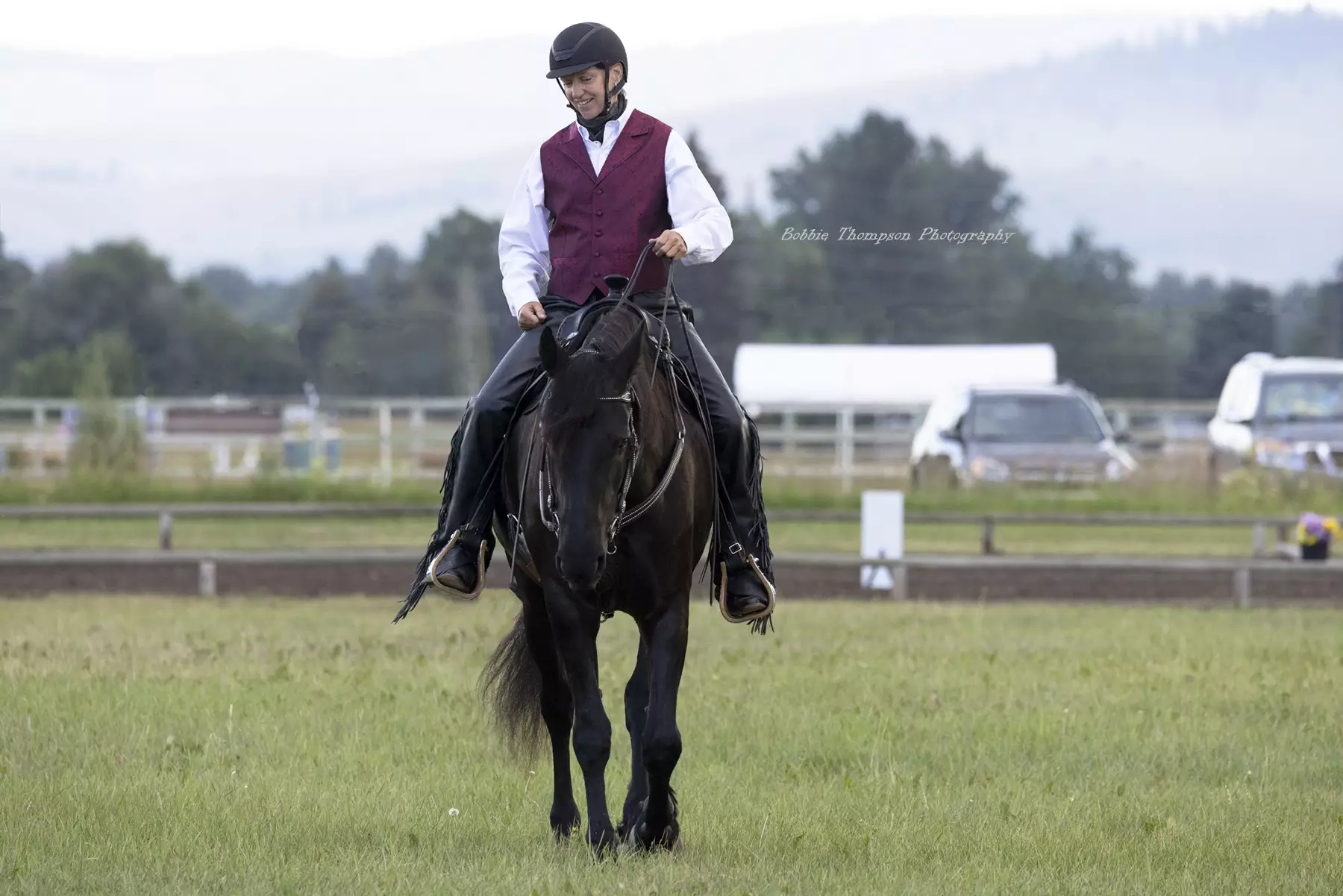 Professional equestrian rider demonstrating horsemanship skills